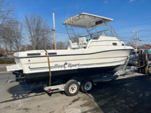 2000 Sea Sport 2744 WA Cuddy with Alum Fiberglass T Top
